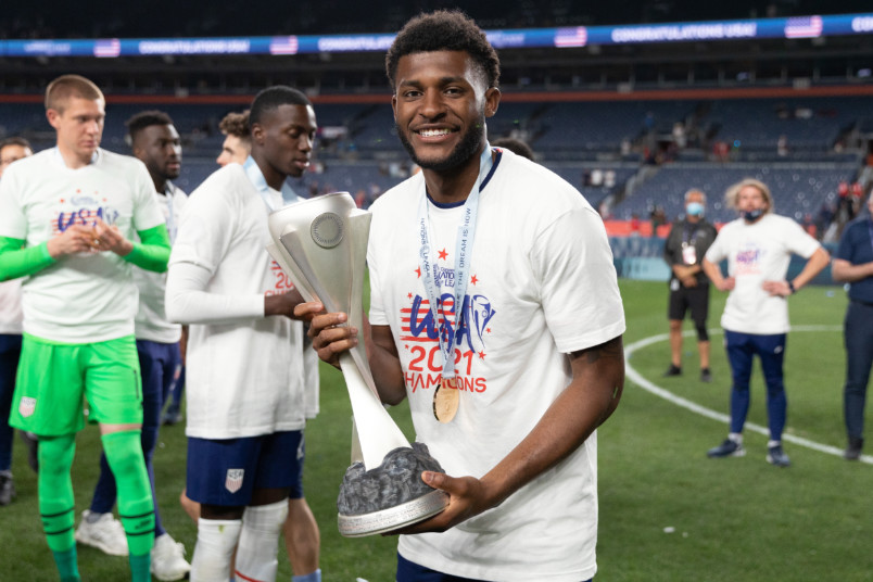 mark mckenzie holding nations league trophy