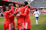 Chicago soccer players celebrating a goal