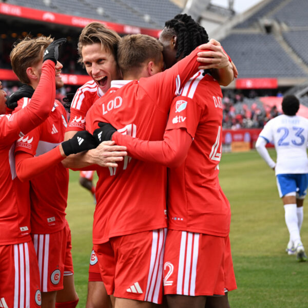 Chicago soccer players celebrating a goal