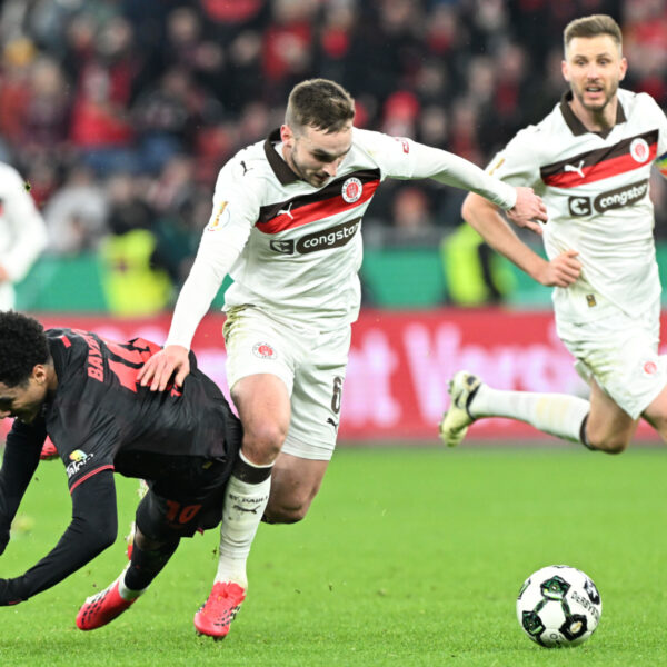 St Pauli player James Sands on the ball.